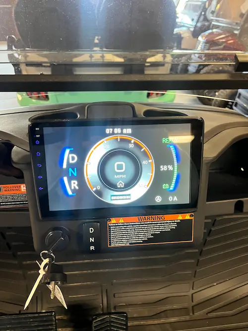 Dashboard display with speed and battery information