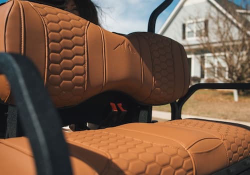 Brown hexagonal-patterned seat cushions in a vehicle