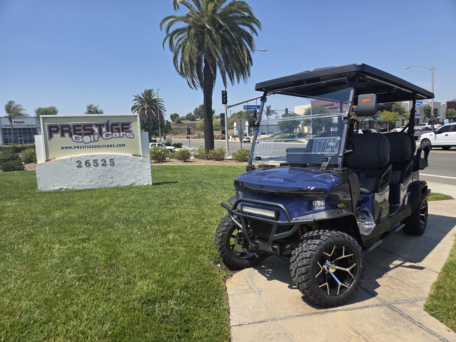 2025 Denago EV Rover XL6 six passenger lithium powered blue colored golf cart for sale at Prestige Golf Cars in Murrieta, CA.